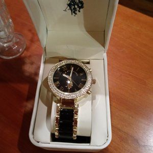 U. S. Polo. NWT Black and Gold Watch